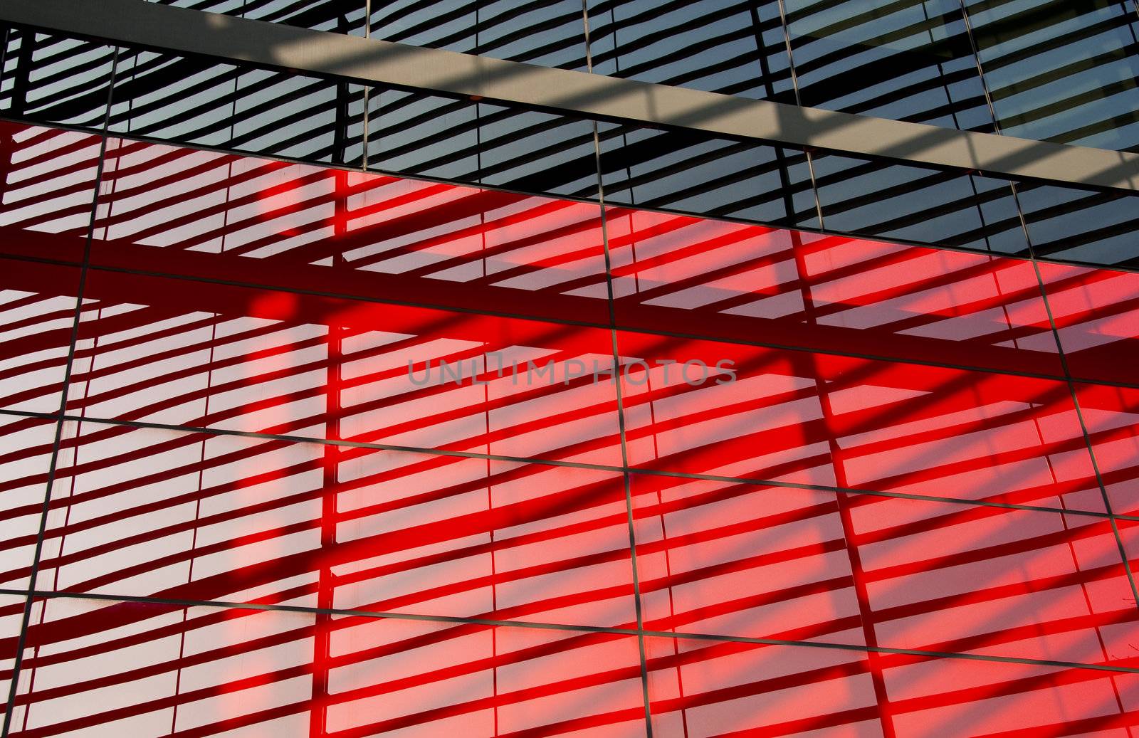 Modern facade close-up picture, steel structure reflecting on the glass