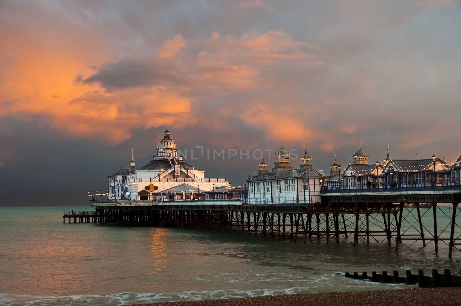 Eastbourne pier at sunset by dutourdumonde