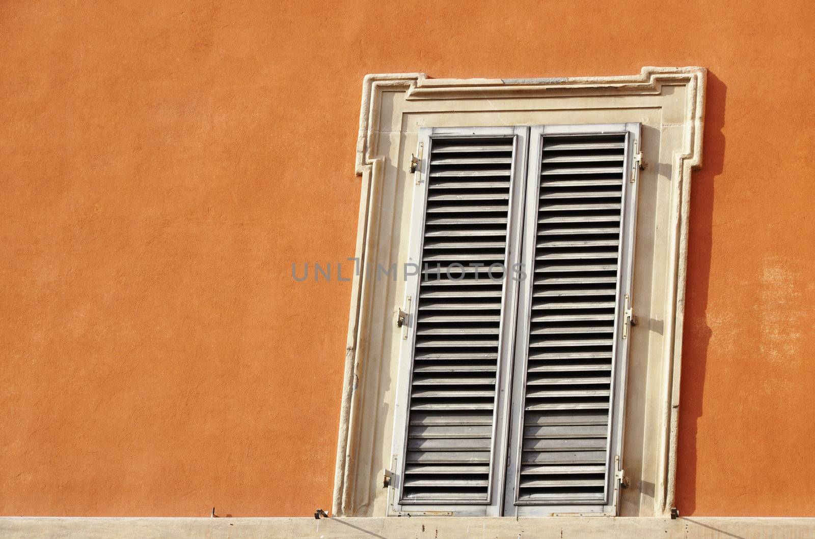 Window in Italy, shutters closed