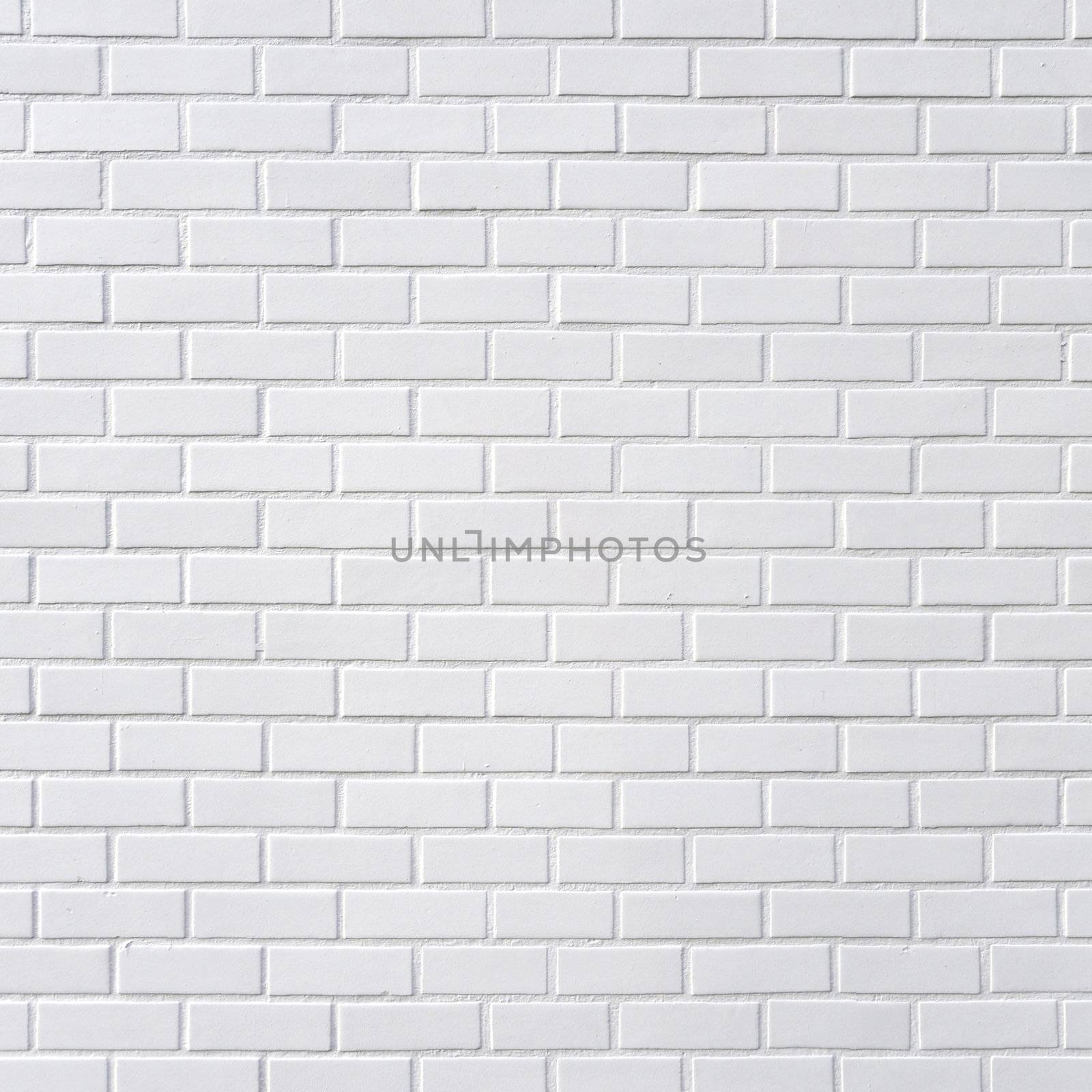 White brick wall by dutourdumonde