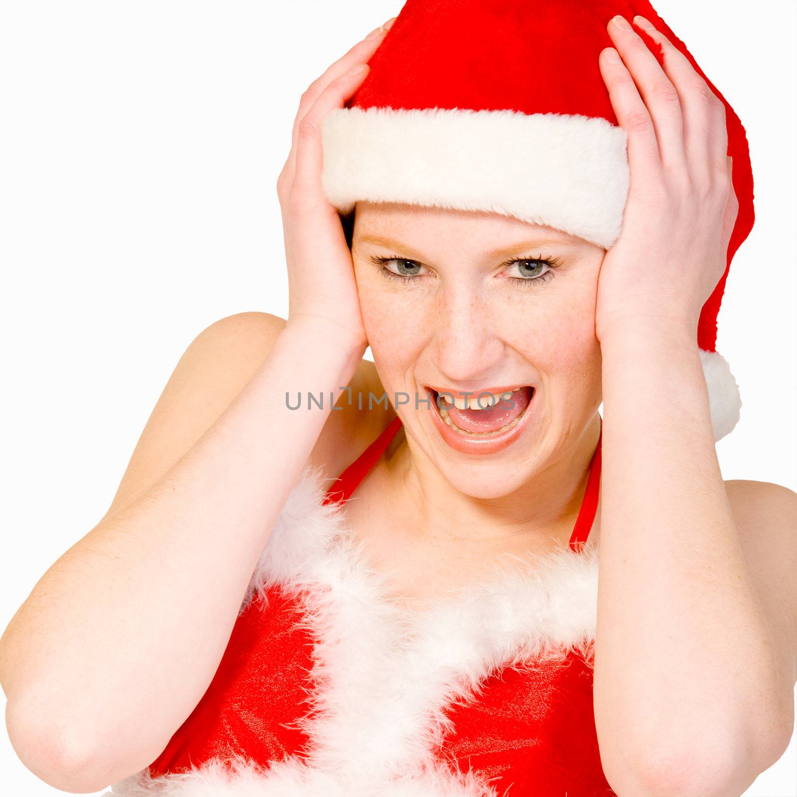 Beautifull girl in christmas bikini and with christmas hat is screaming. 