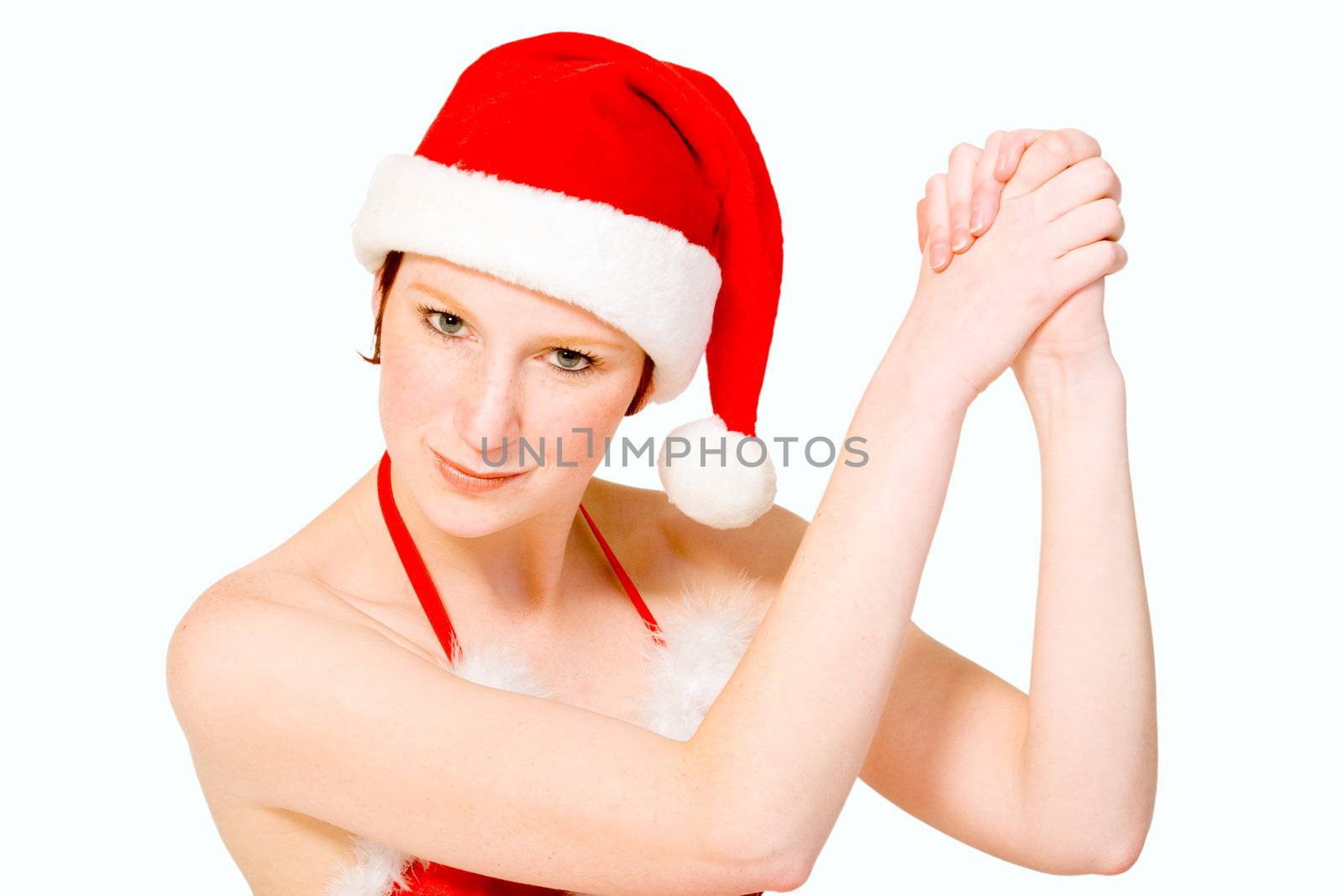 Beautifull girl in christmas bikini and christmas hat celebrating. With background clipping path for your convenience 