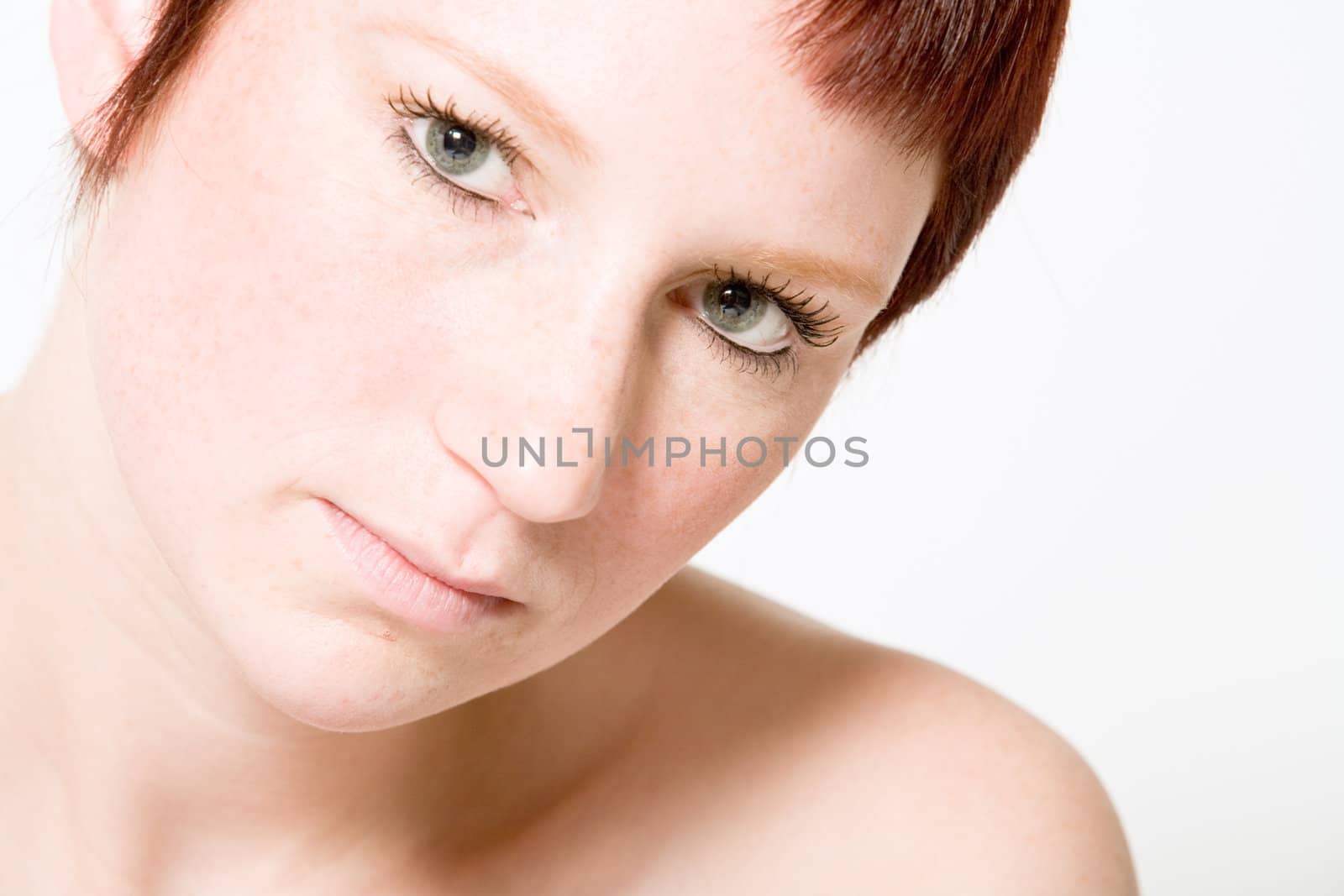 Studio portrait of a questionable looking young woman with short by DNFStyle