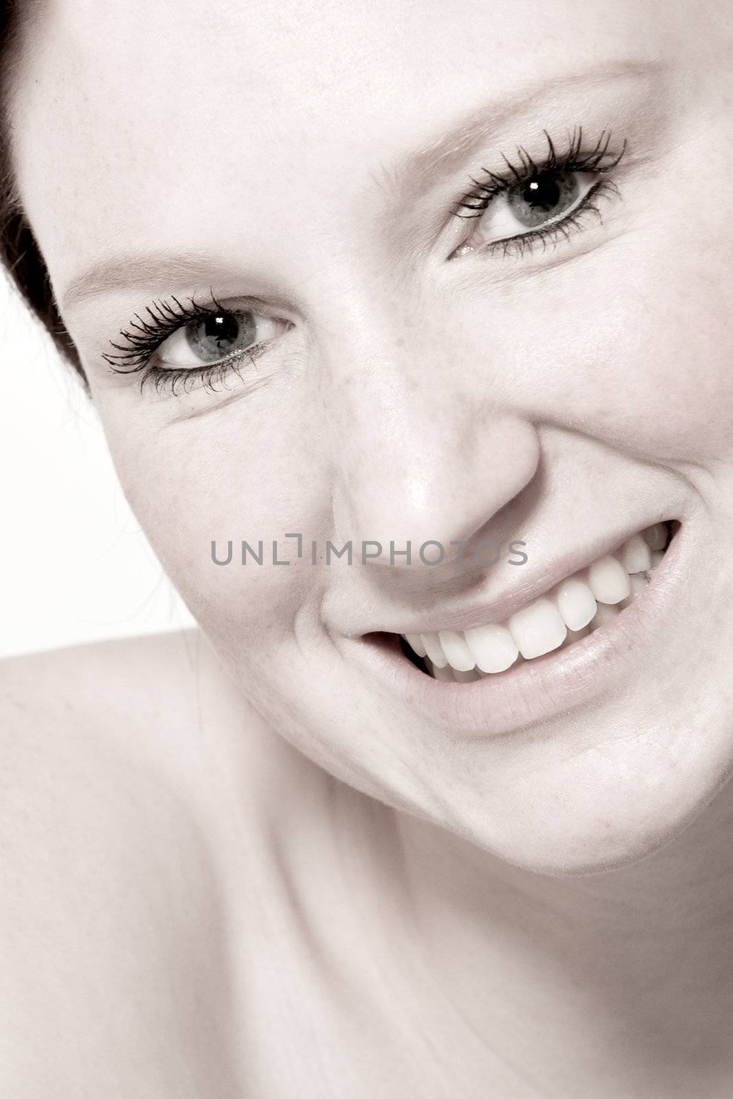 Studio portrait of a flirting young woman with short hair 