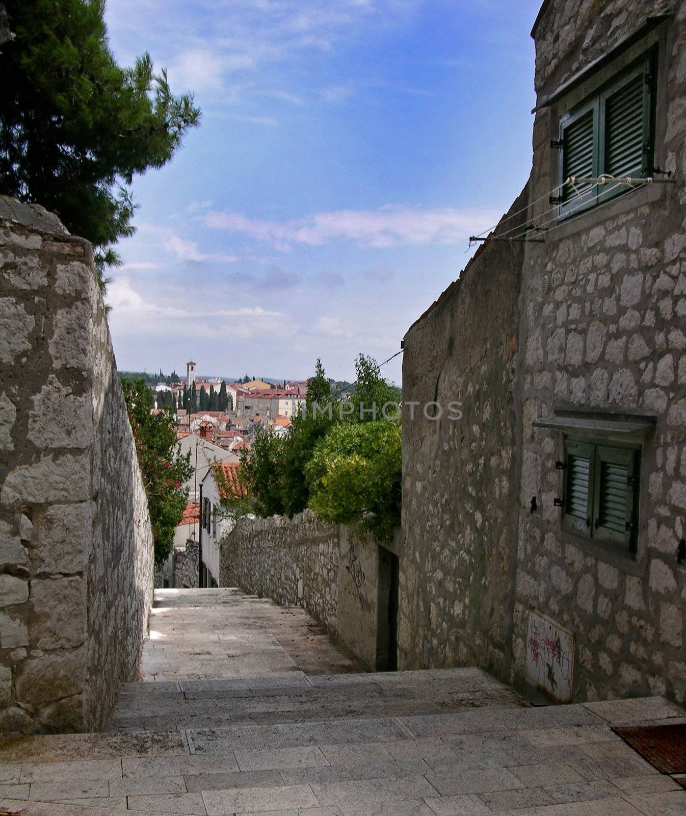 narrow pedestrian street in old town (Rovinj, Croatia)
