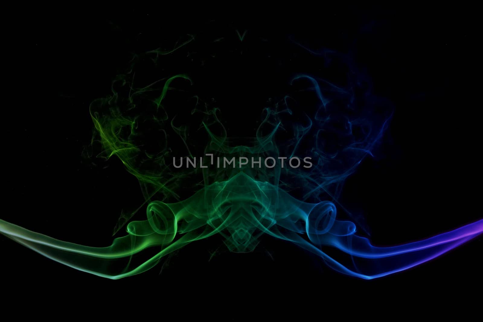 abstract picture of coloured smoke on the black background