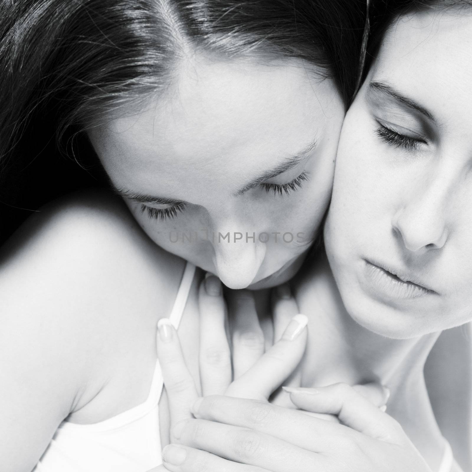 two beauty girlfriends in lingerie in the photo studio 