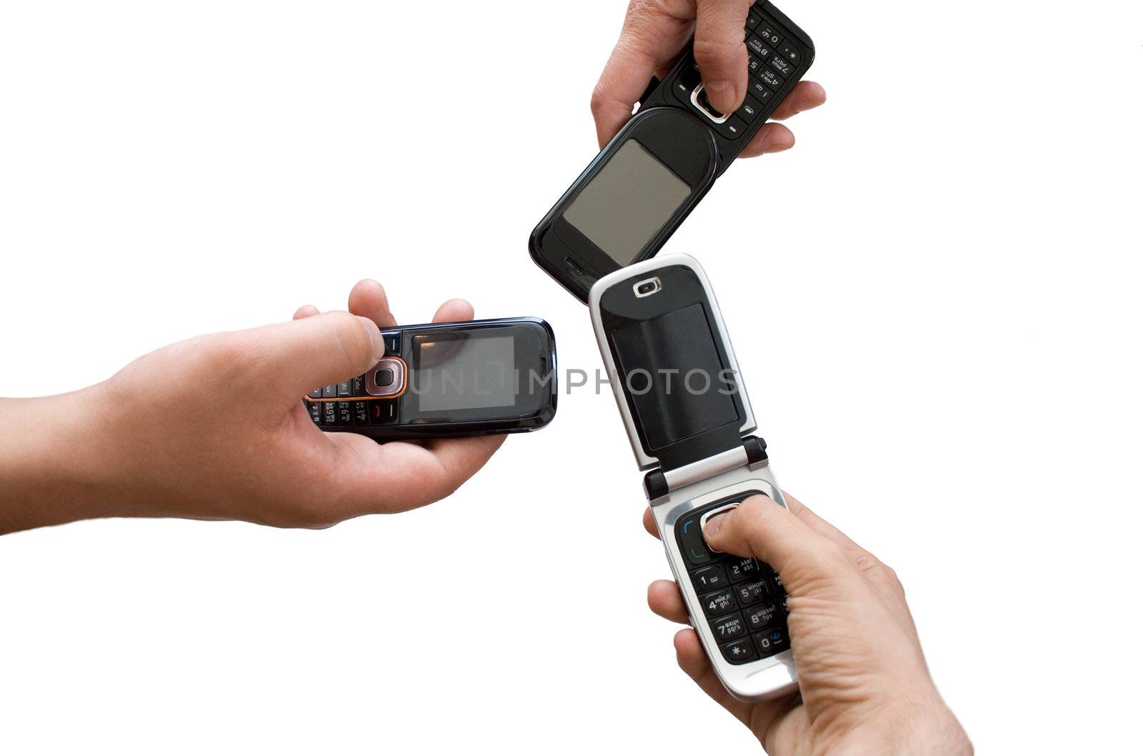 three mobile phones in hands 