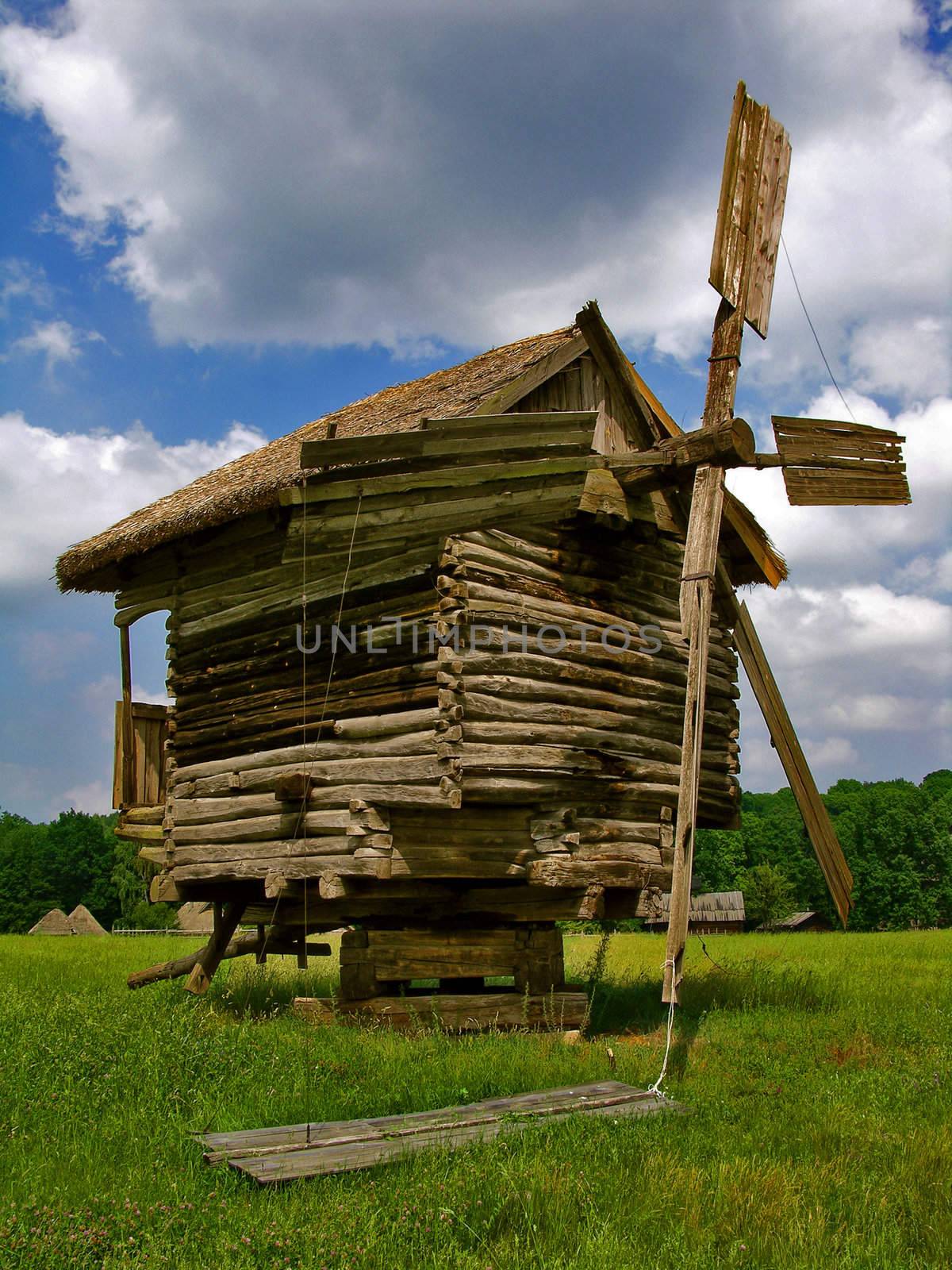 Ukrainian ancient  wooden mill in Pirogovo village by Sergieiev
