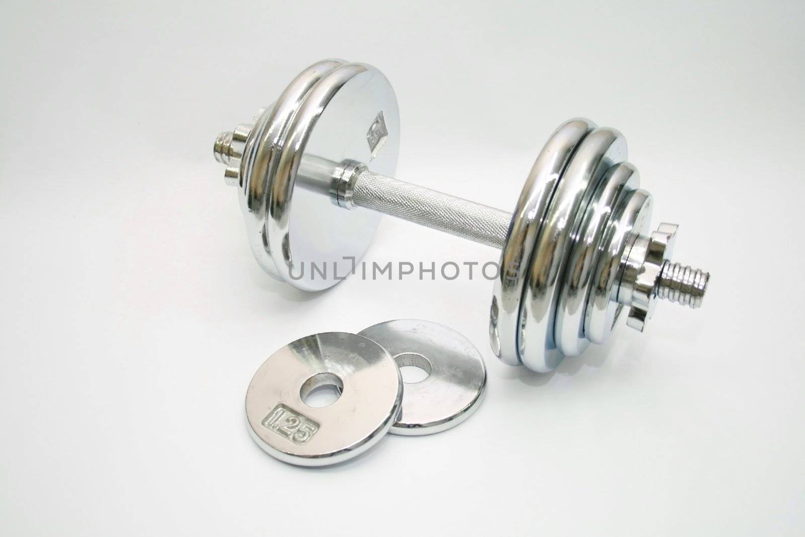 chrome plated dumb bell isolated on white background
