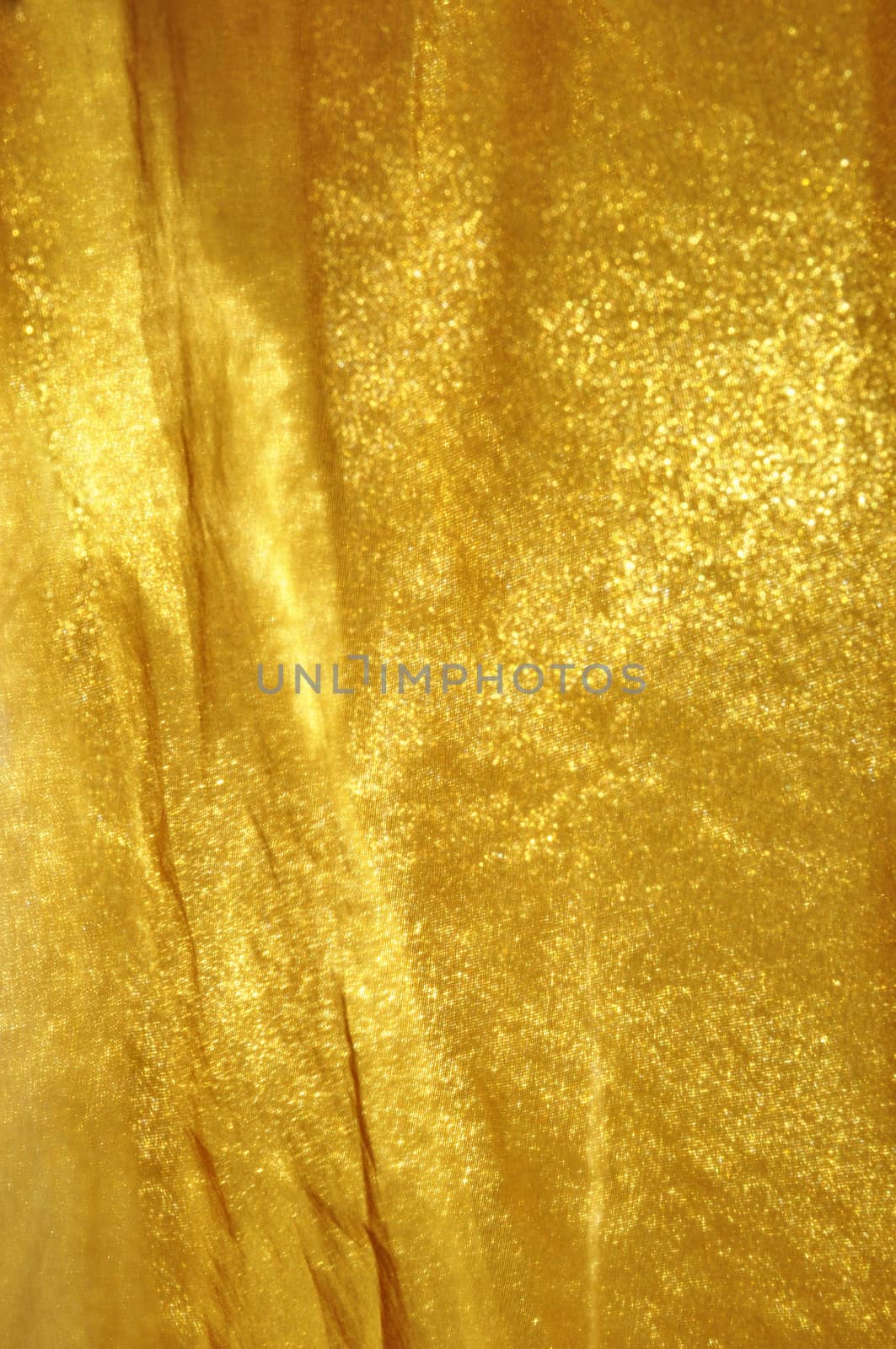 Golden fabric background by dutourdumonde