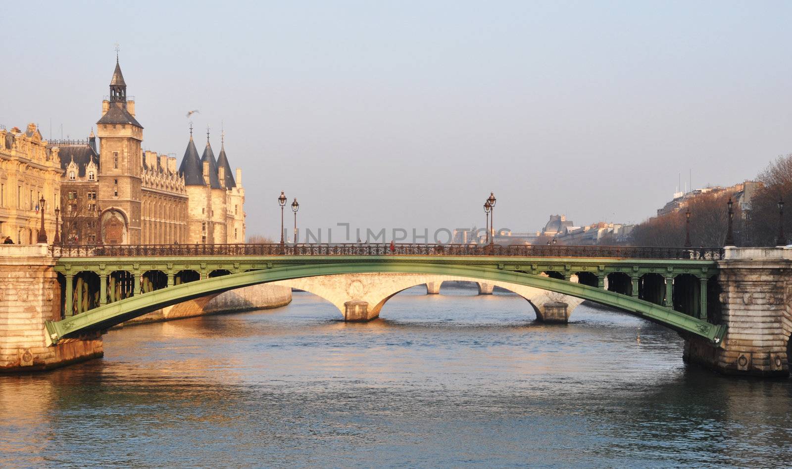 Notre-Dame bridge and the Conciergerie in Paris, France