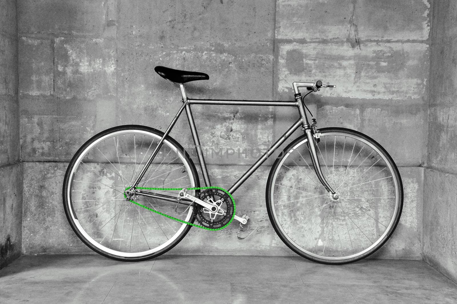Vintage fixed gear bicycle, black & white picture, green chain