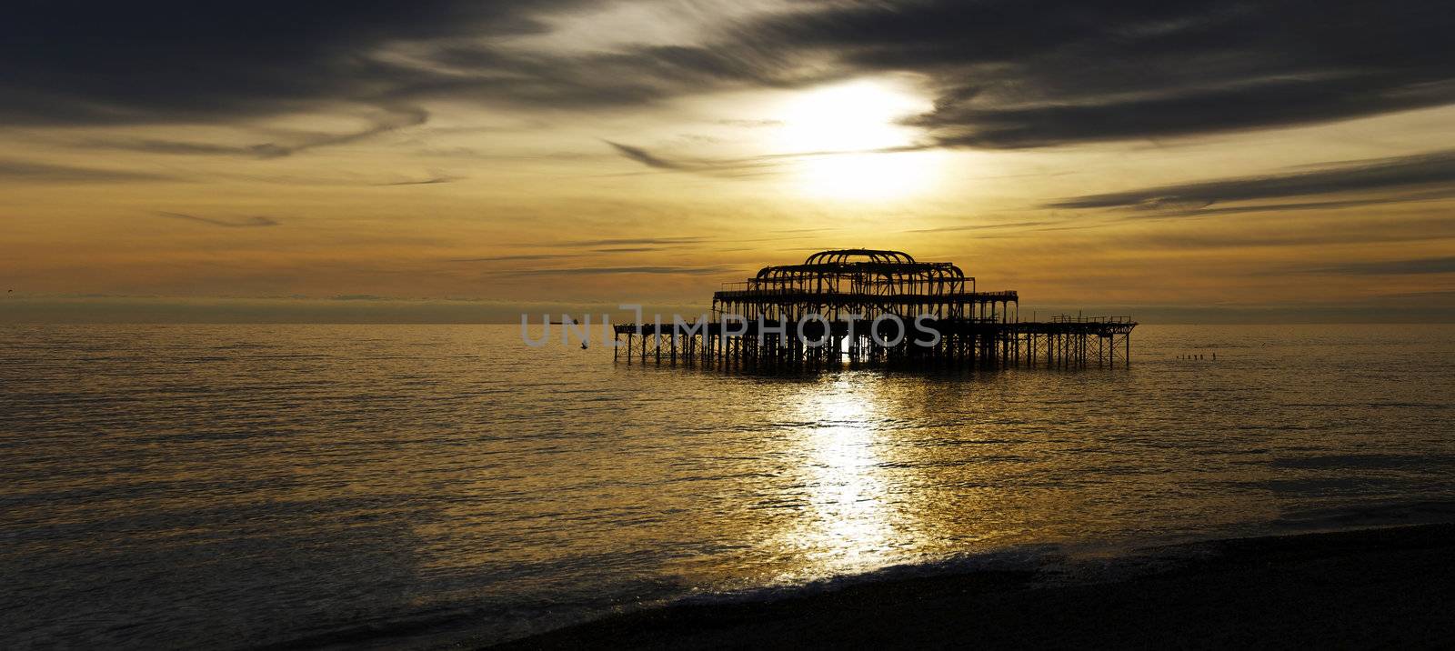 Panoramic view of the West Pier in Brighton at sunset