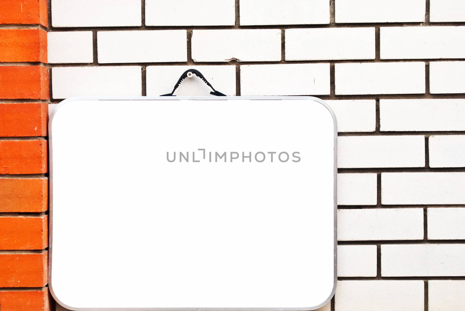 Large billboard with blank white paper ready for text.