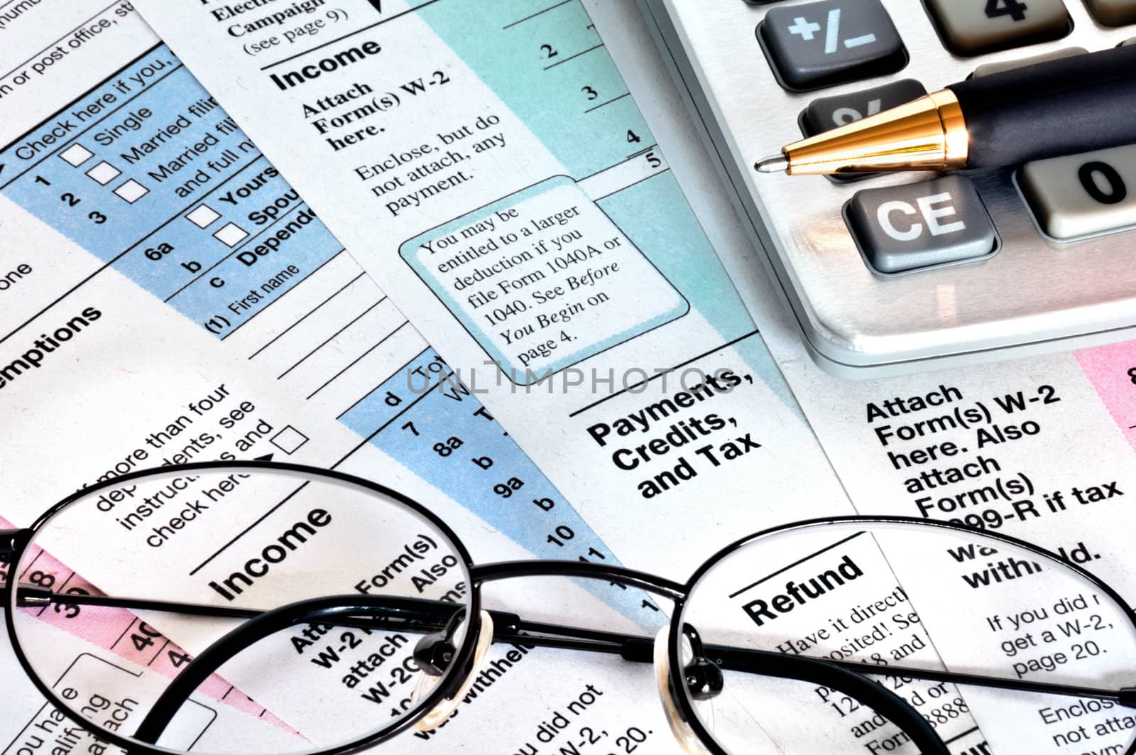 Business concept. Financial papers with calculator, glasses and pen.
