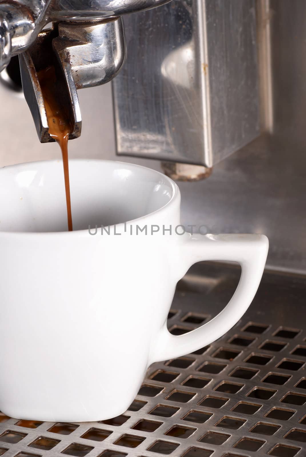 Preparing a strong black coffee with a professional machine