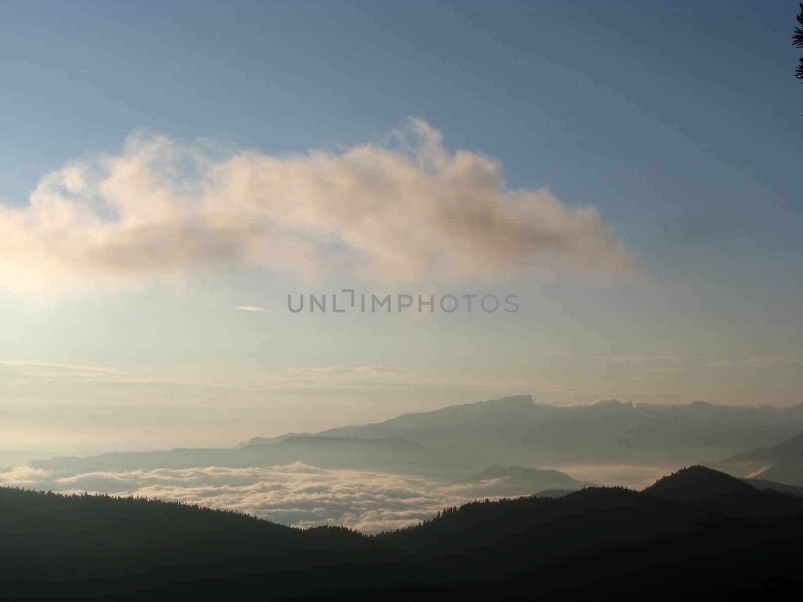 Mountains; rocks; a relief; a landscape; a hill; a panorama; Caucasus; top; a slope; clouds; the sky; a landscape