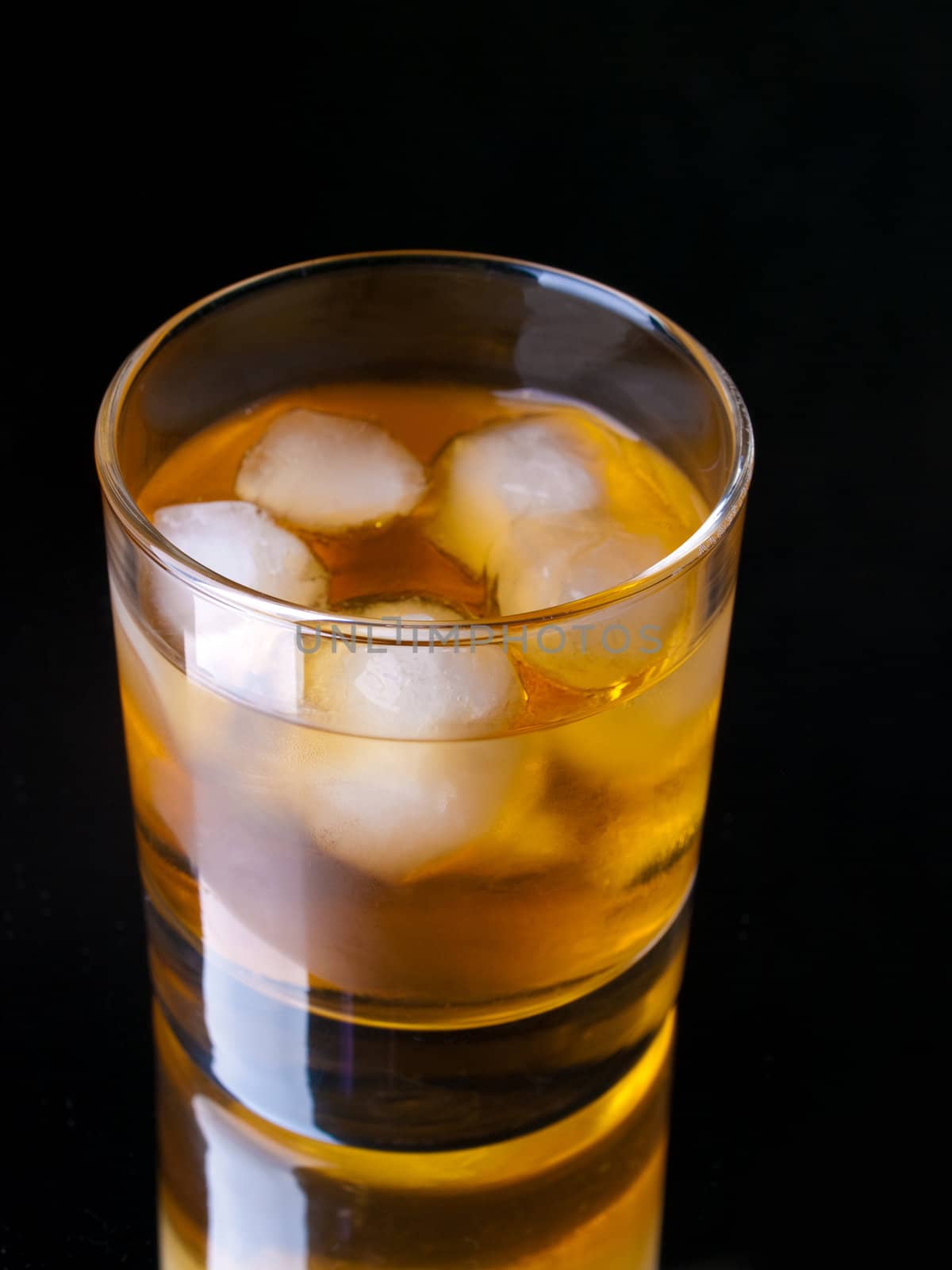 Glass of good old whiskey, studio shot