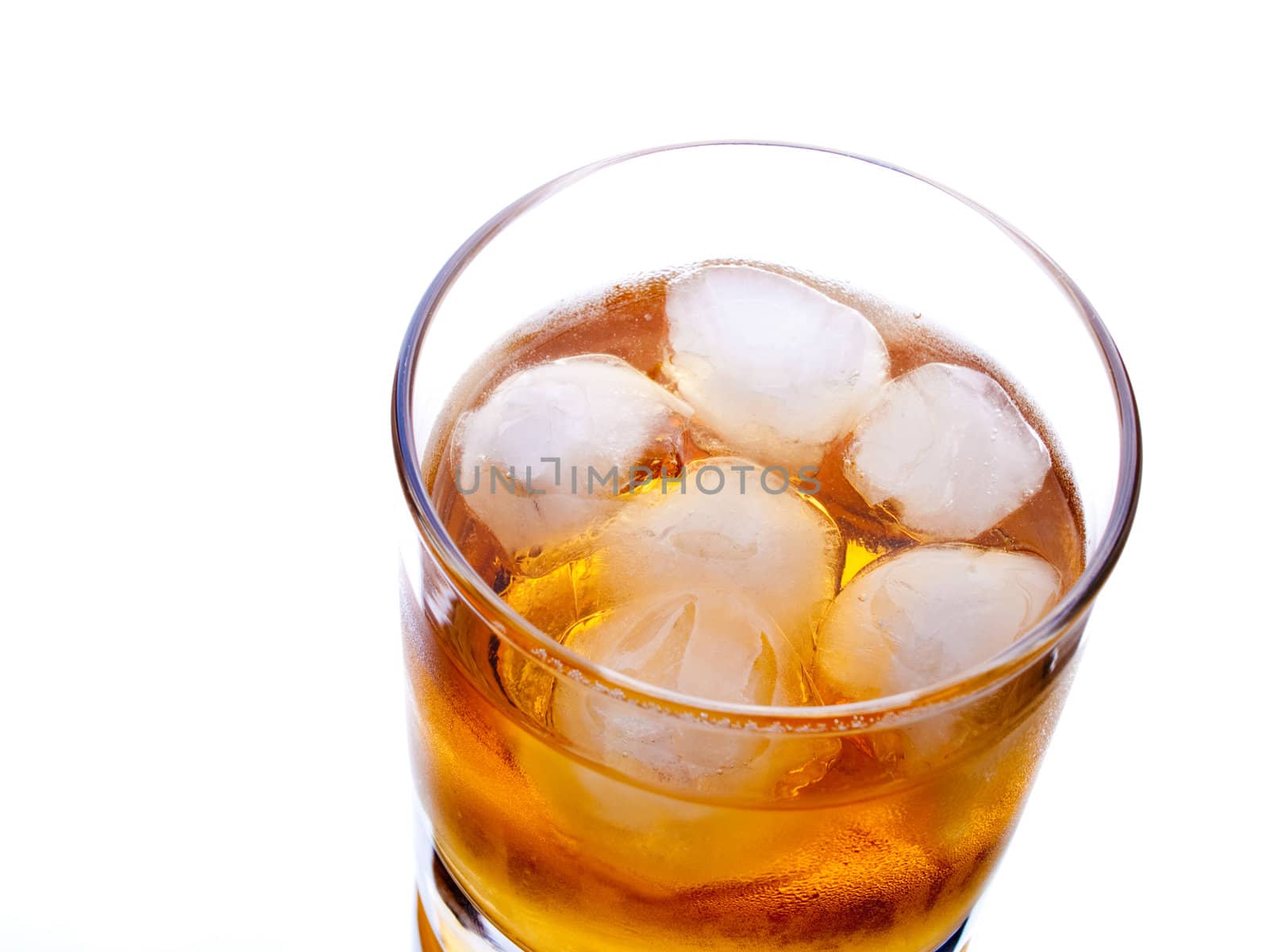 Glass of whiskey on white background