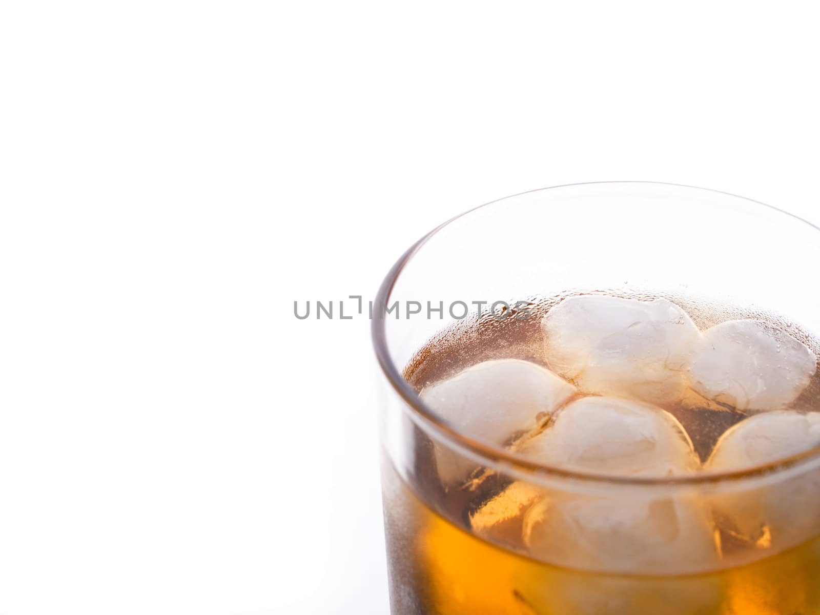 Glass of whiskey, close-up, studio shot