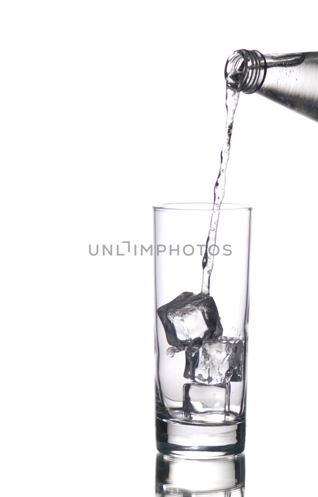 Sparkling water being poured in a glass