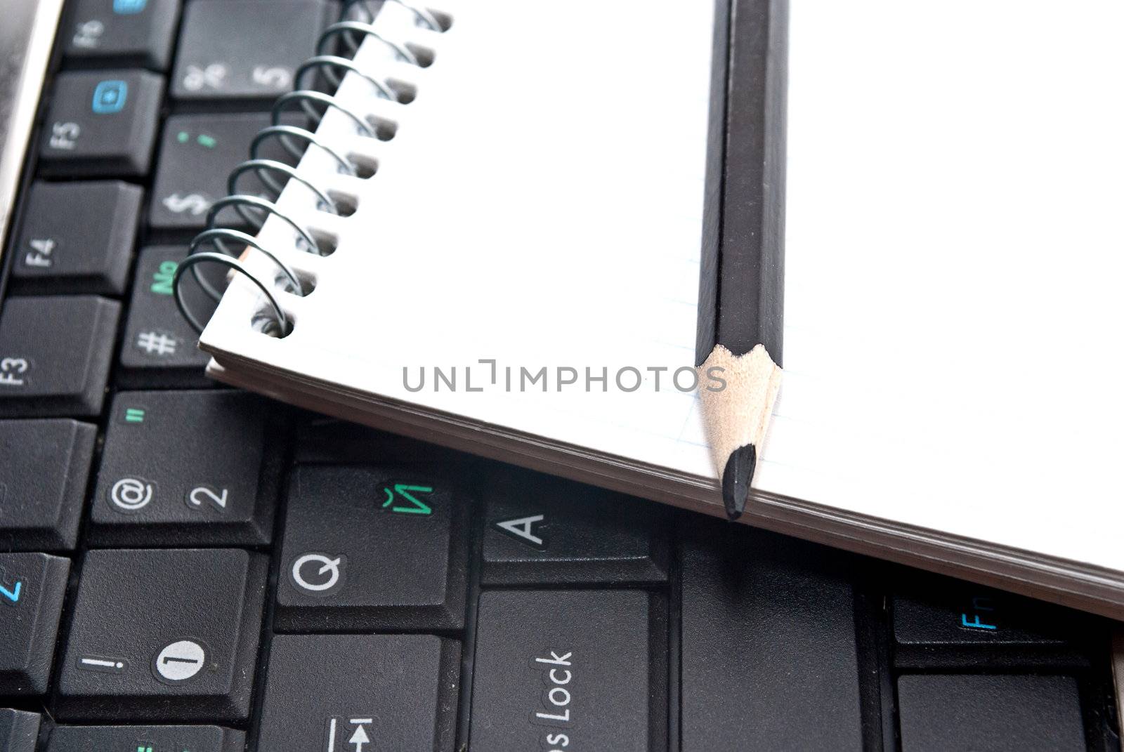 Collected notes over a laptop by Diversphoto
