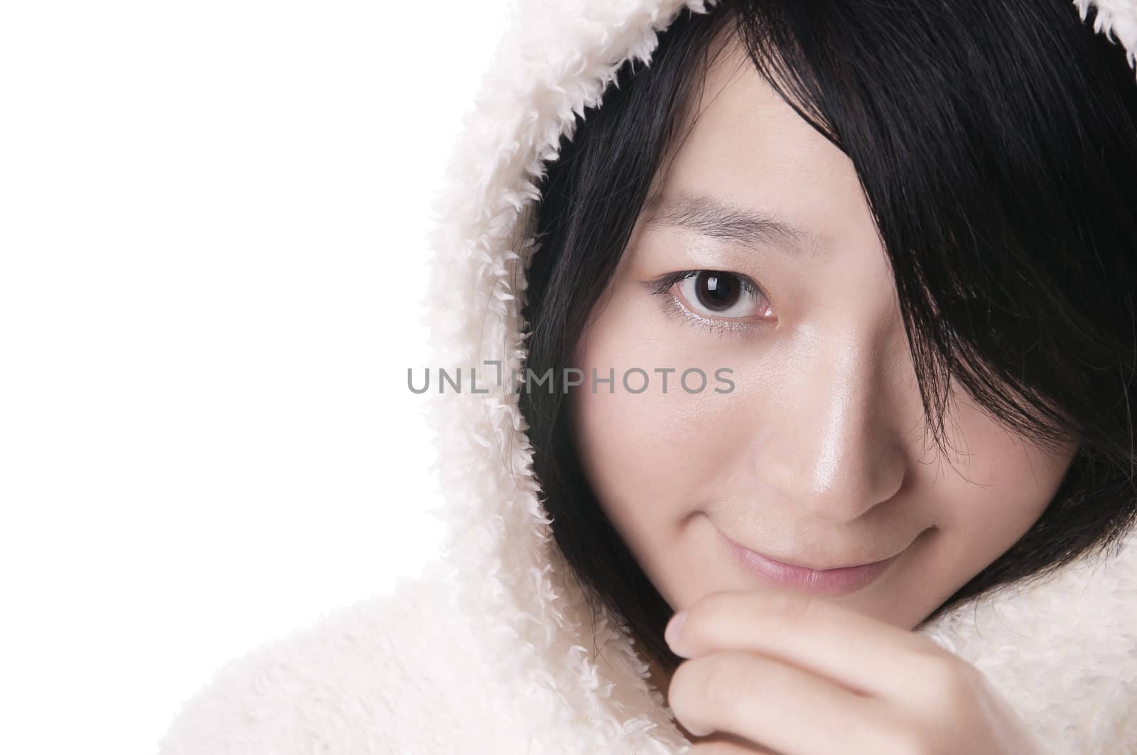 Beautiful young woman in winter outerwear on white
