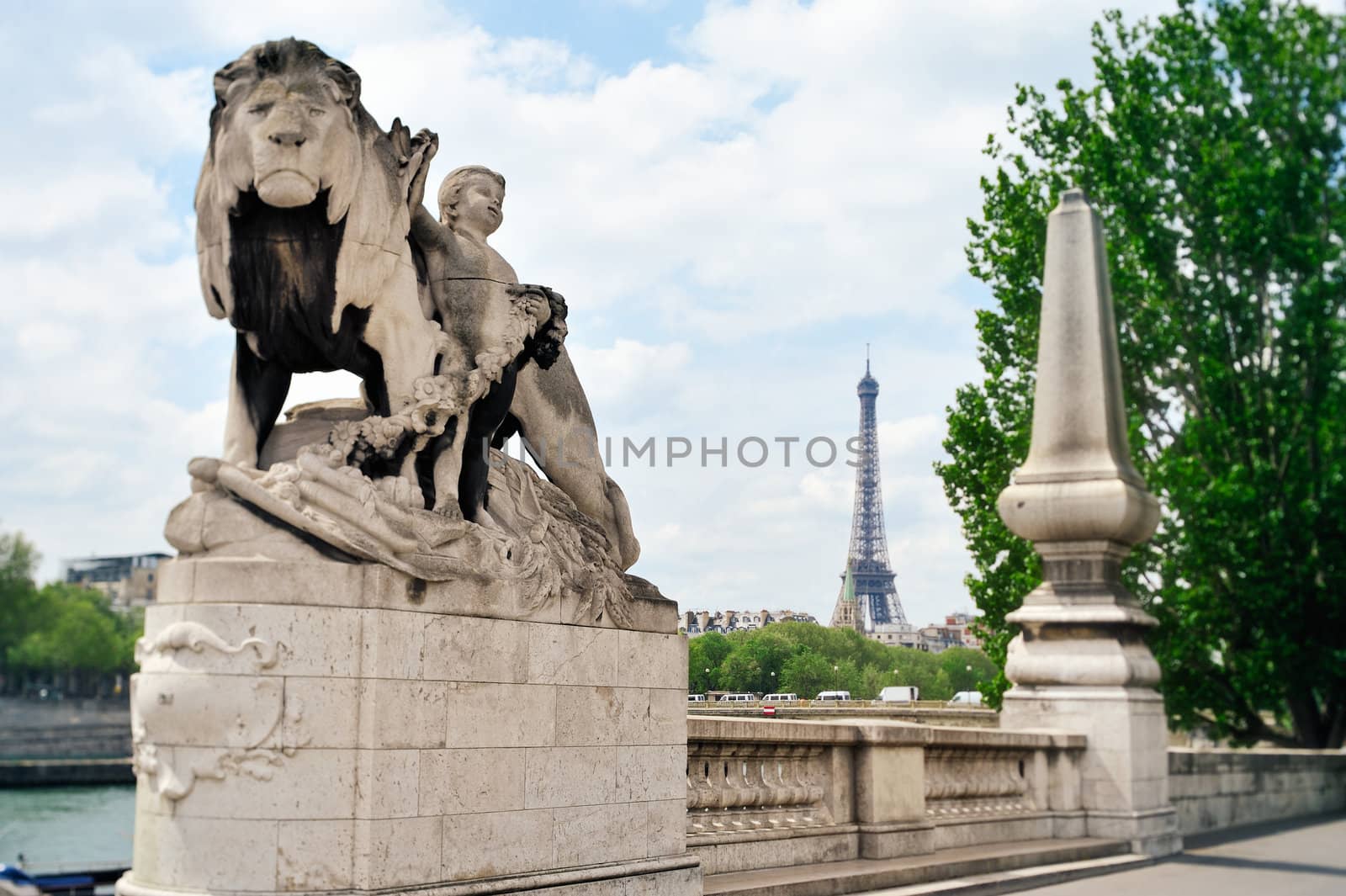 Statue of a lion on Alexander's bridge III. Photo with tilt-shift effect
