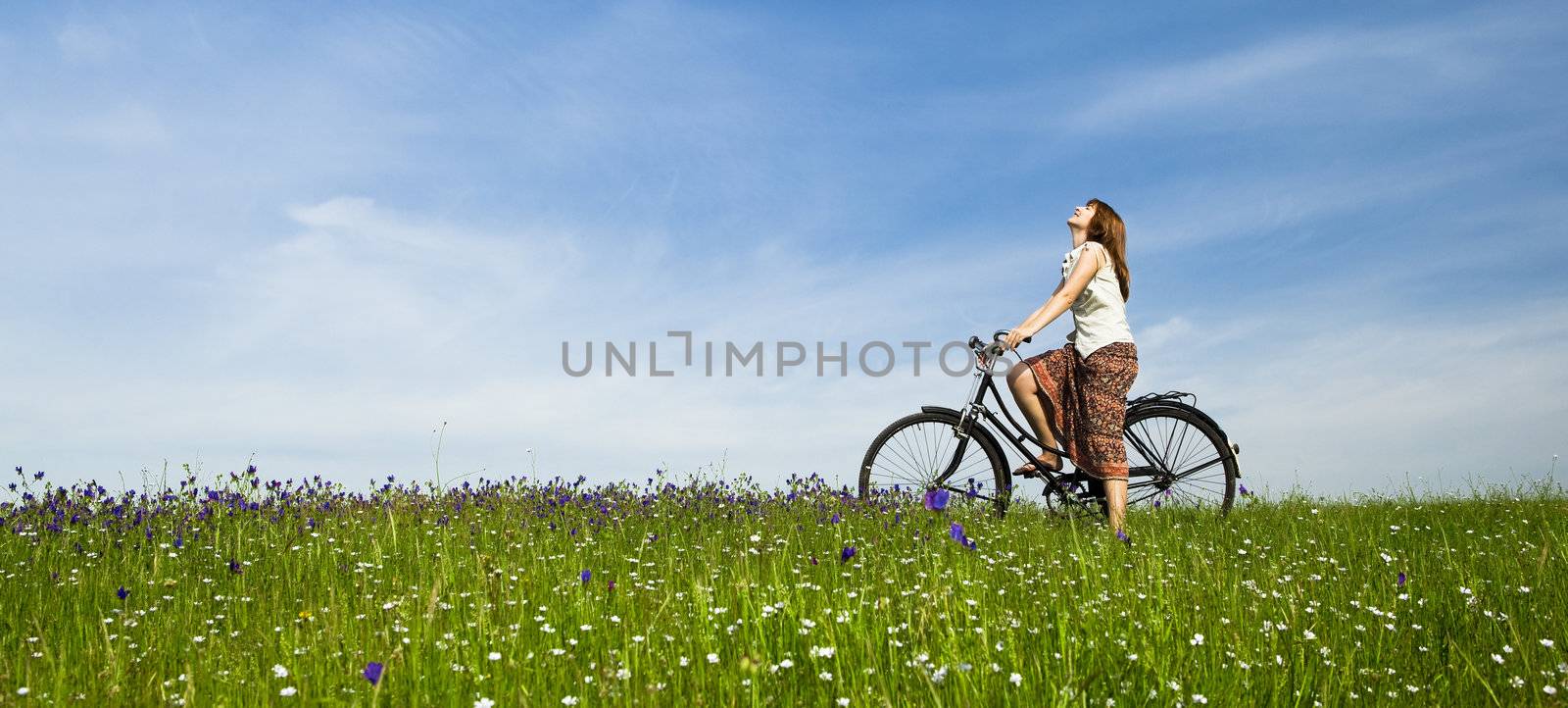 Girl with a bicycle by Iko