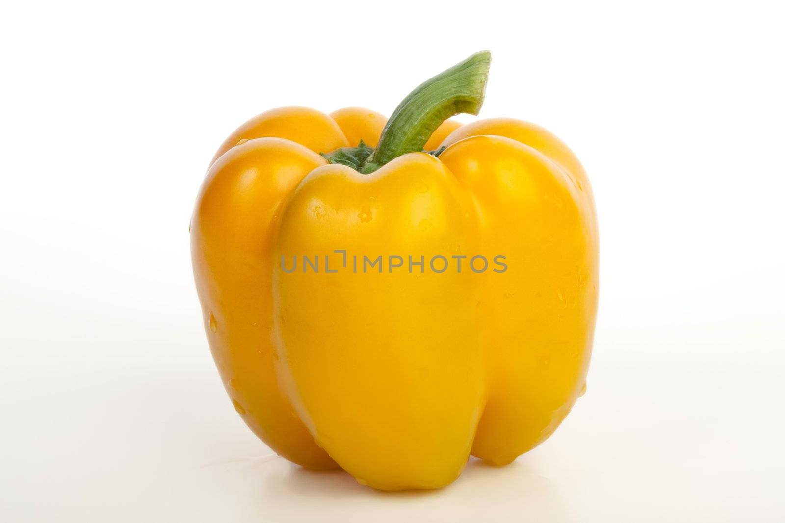 Yellow bell pepper isolated on white.