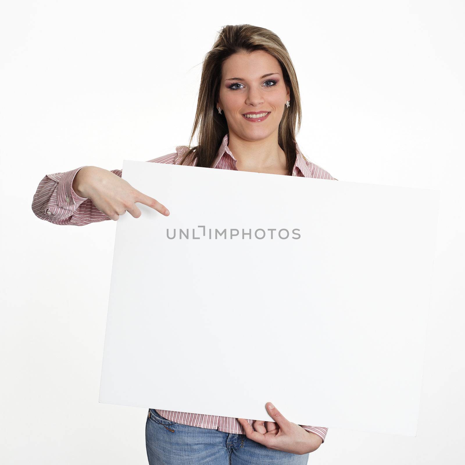 young woman in studio with white board