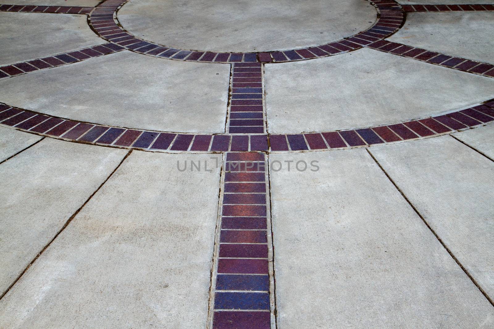 Concrete and red Brick circles on a school plaza