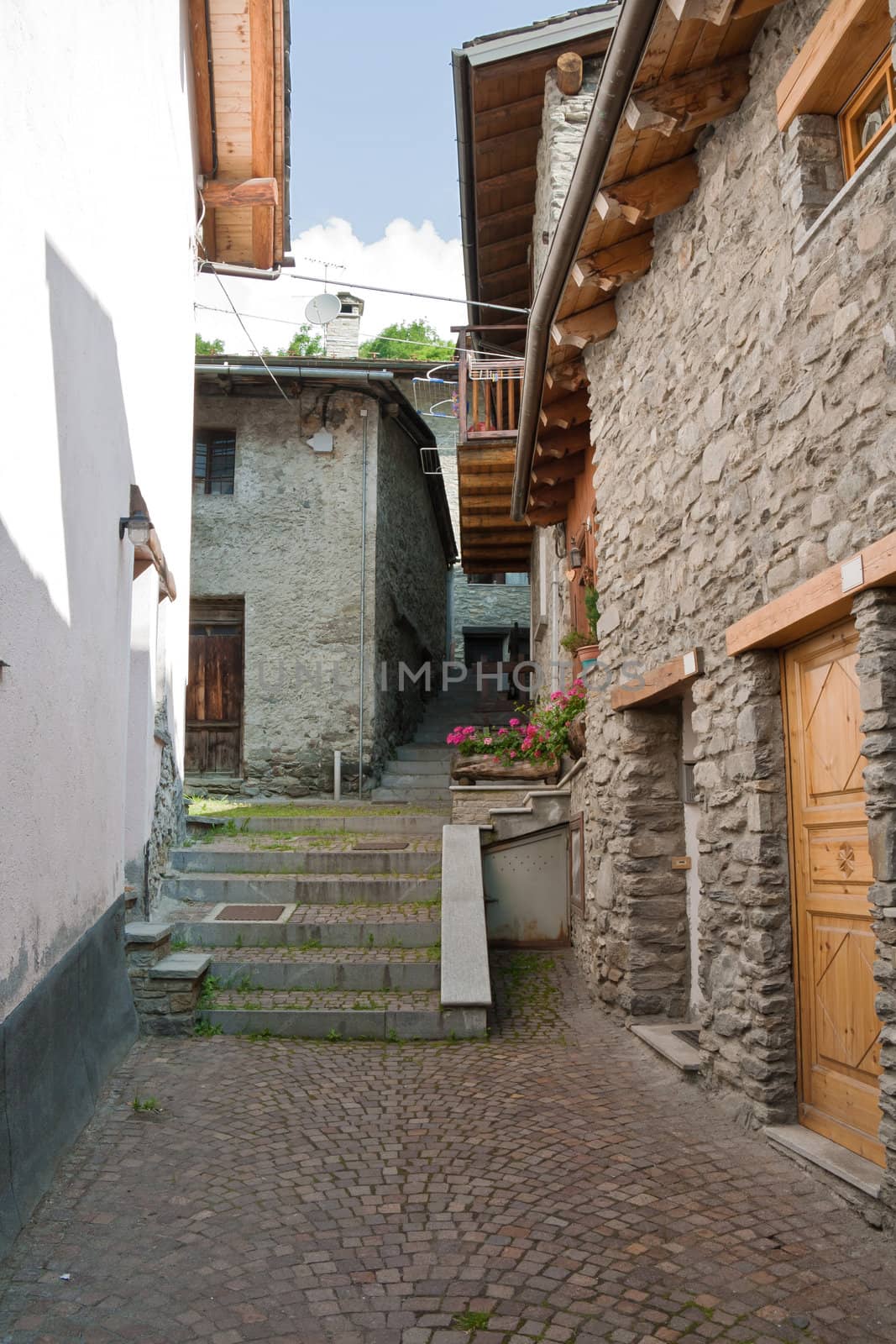 ancient stone homes and steet in La Thuile, Aosta Valley, Italy