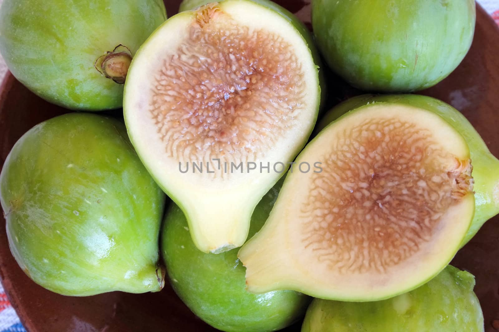 Ripe green figs whole and half