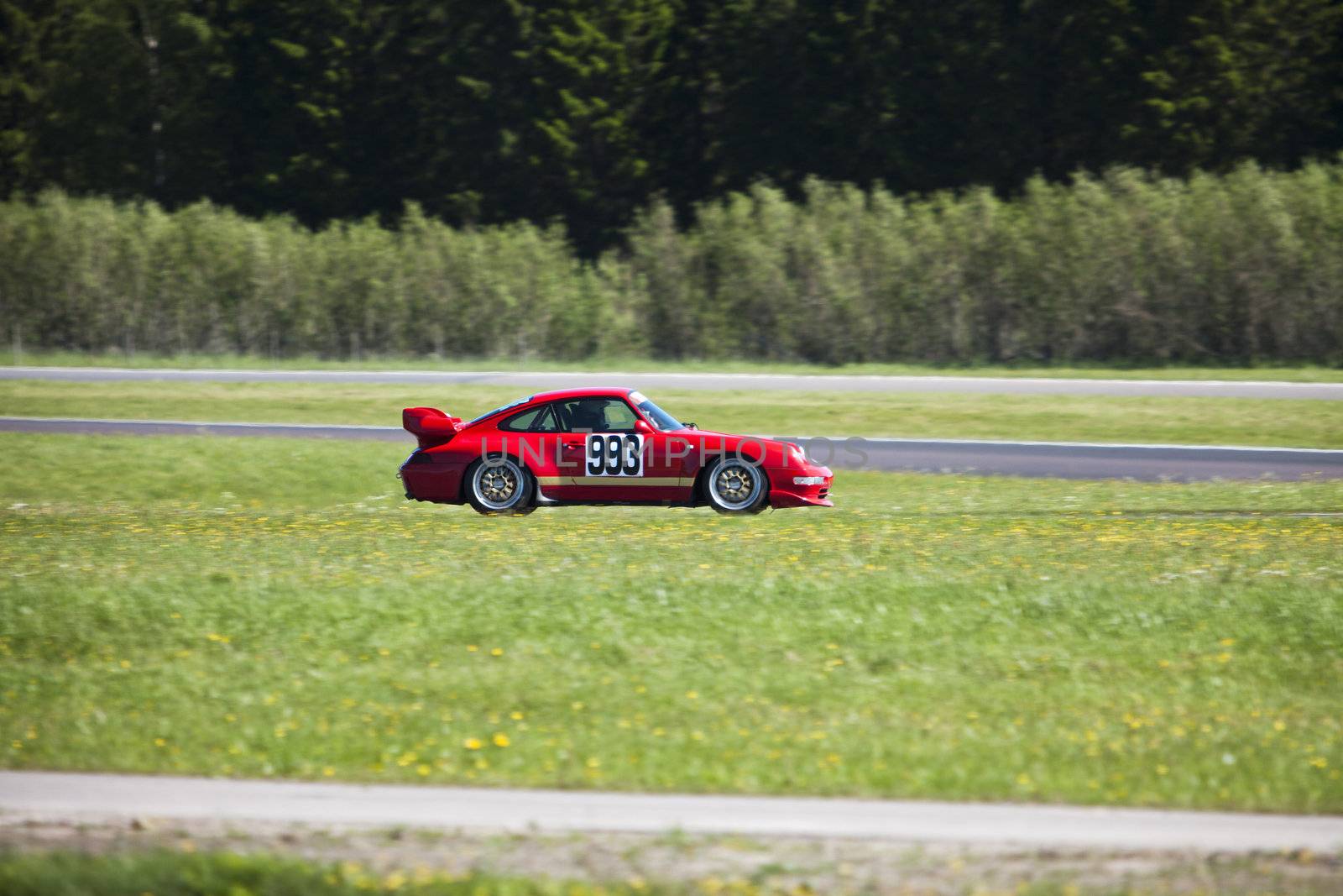 Red Racing car in movement