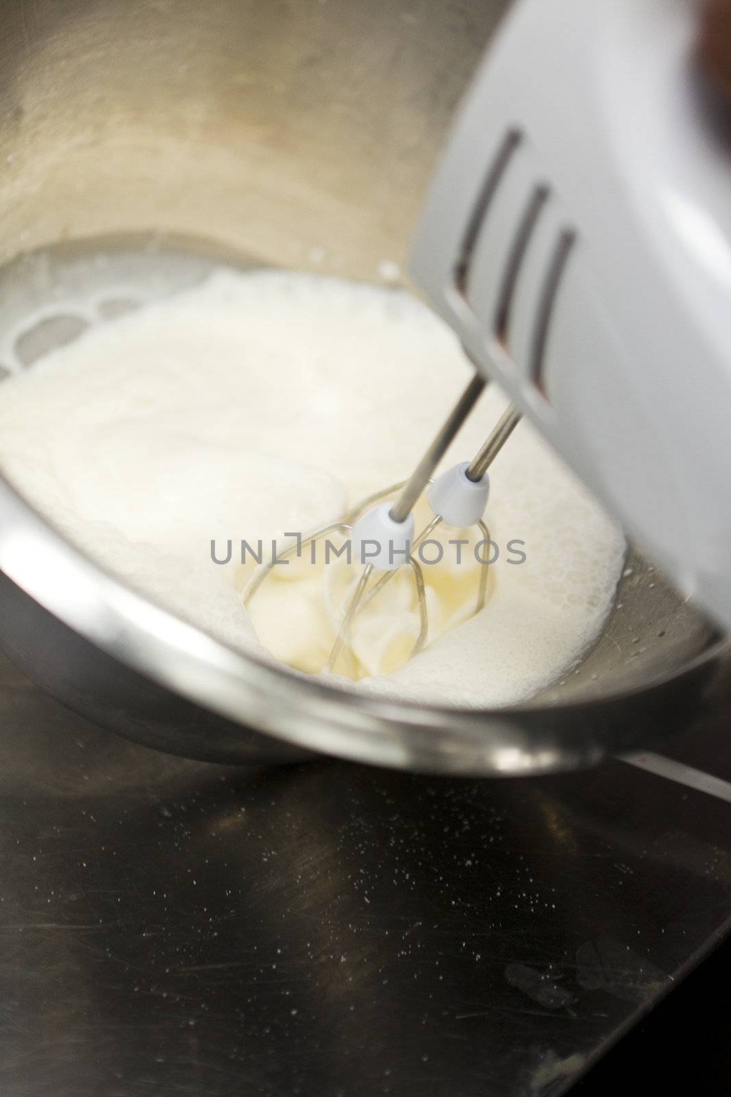Mixing cream movement close up