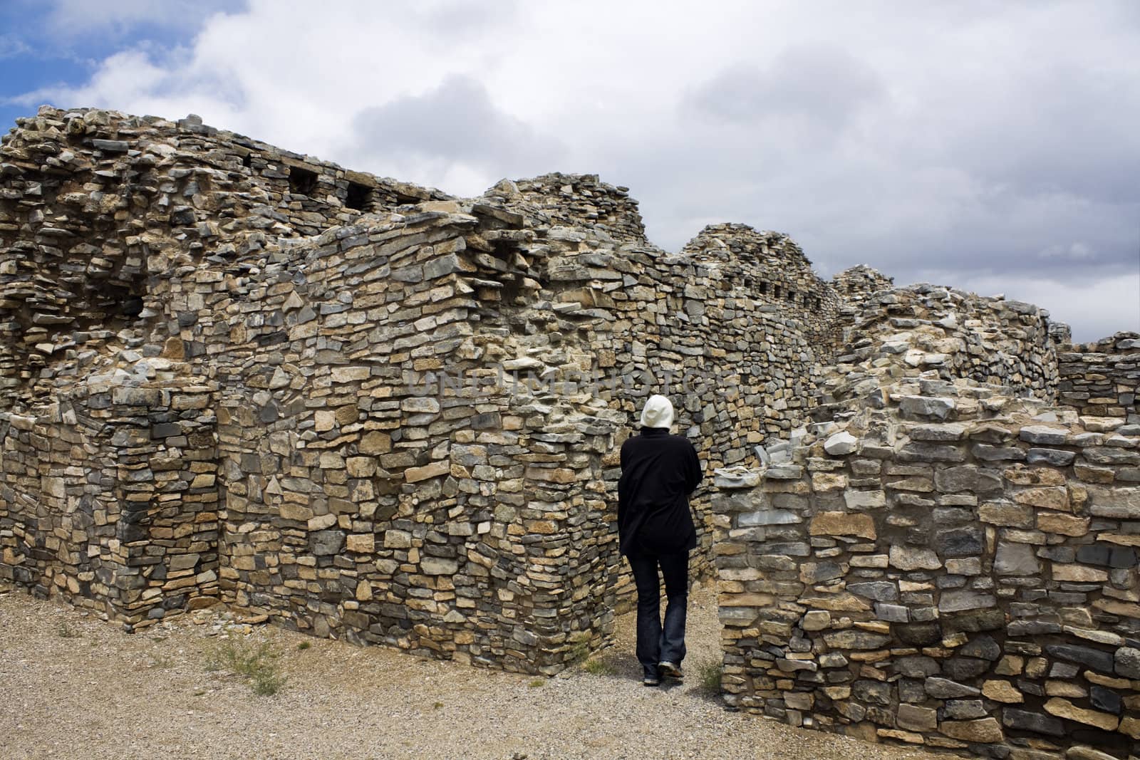 Tourist in Gran Quivira Ruins in New Mexico, USA.