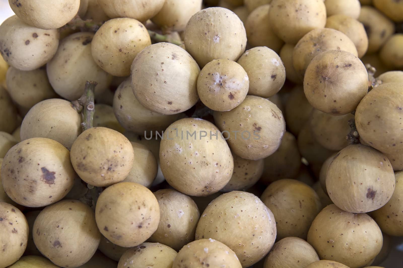 Duku Langsat on Fruit Stand in Tropical Country