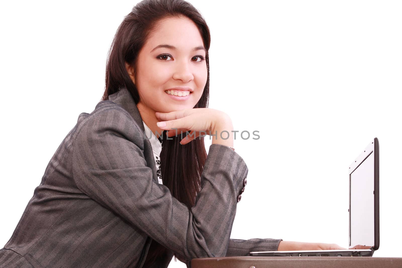 beautiful asian woman using her laptop by dacasdo