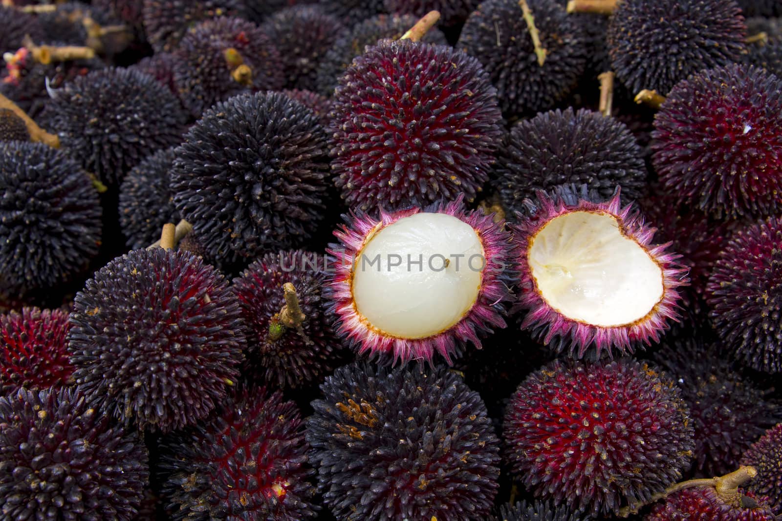 Buah Pulasan Fruit on Vendor Stand in Tropical Country