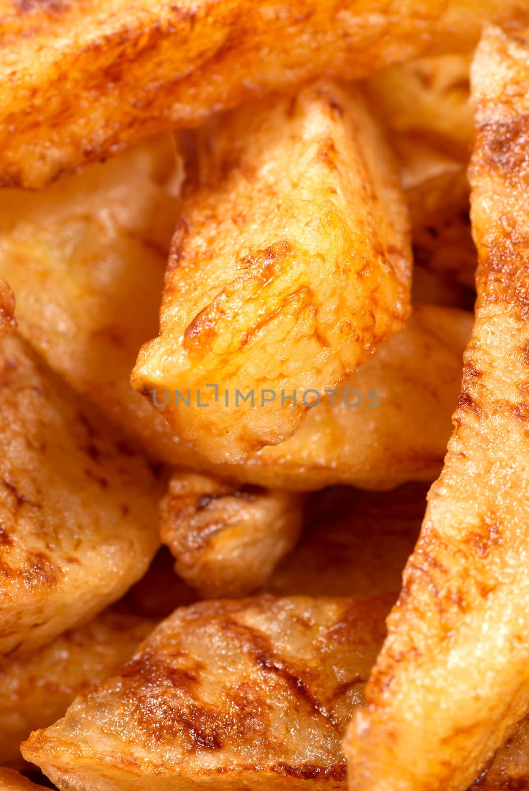 Background of freshly homemade fried potato chips