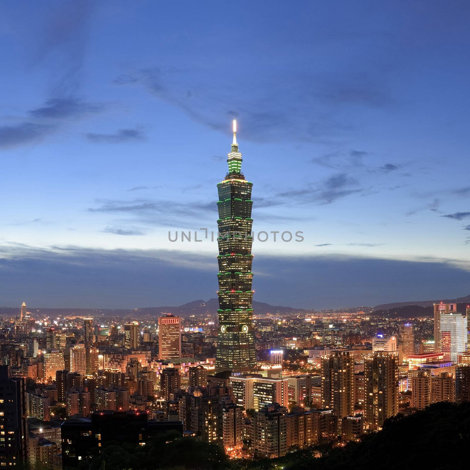 City skyline in night with famous 101 skyscraper and buildings in Taipei, Taiwan.