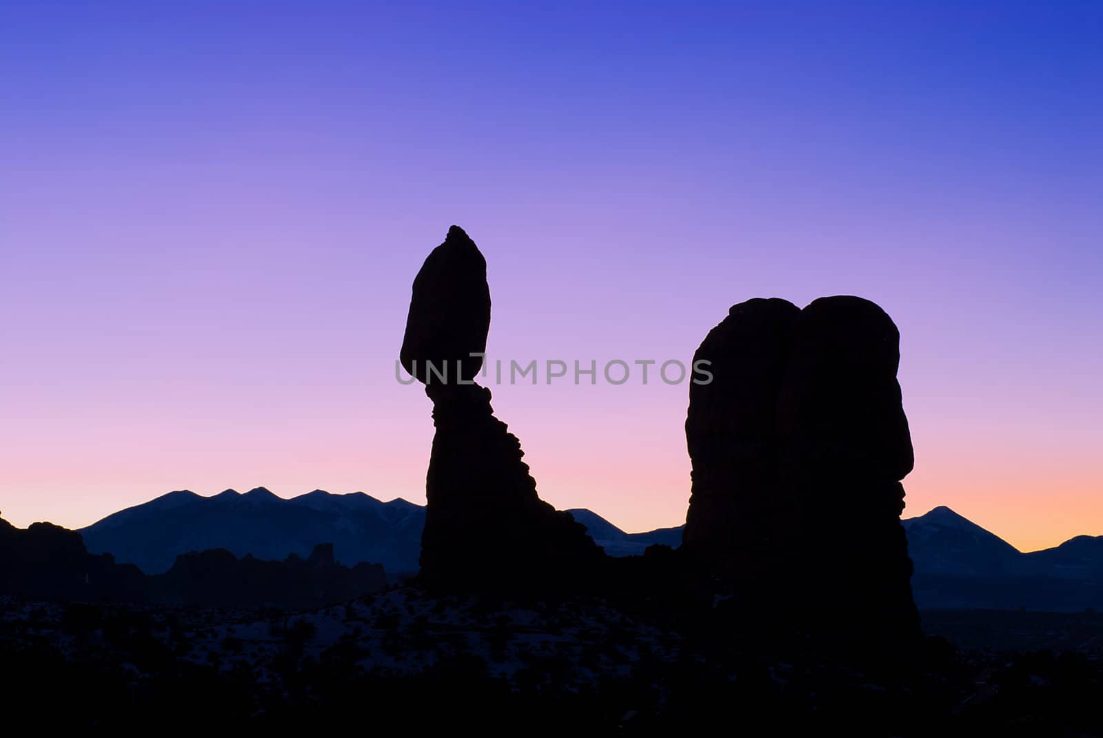 Balanced Rock and the La Sal Mountains at sunrise, Arches National Park, Grand County, Utah, USA by CharlesBolin