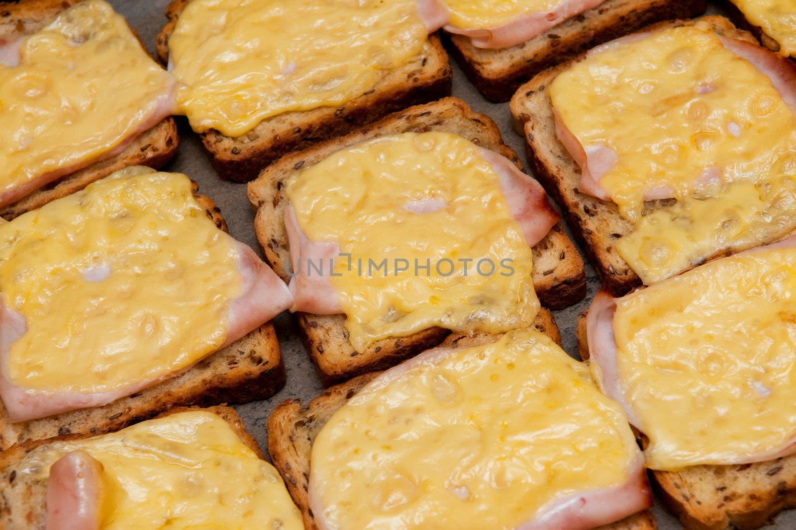 Toasts with cheese and ham
