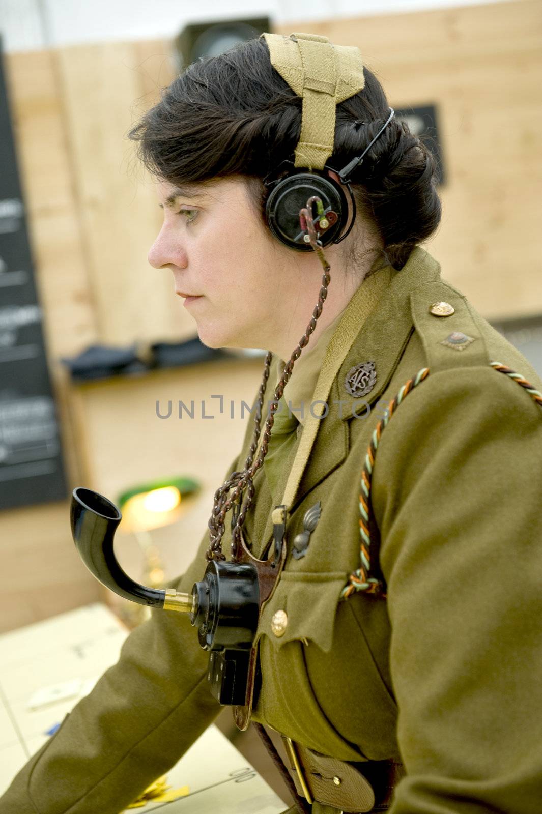 The woman in clothes English military a communications service provider of times of 40th years, taken on September 2011 on Goodwood revial in UK