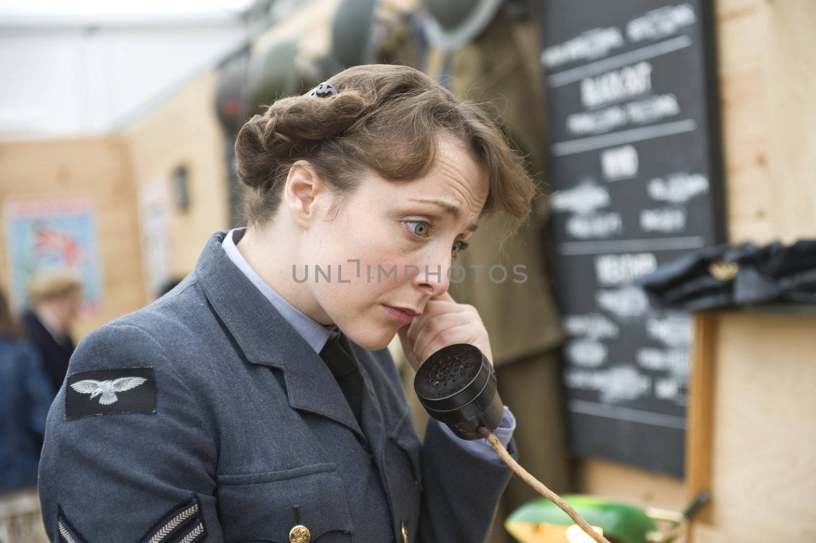 The woman in clothes English military a communications service provider of times of 40th years, taken on September 2011 on Goodwood revial in UK