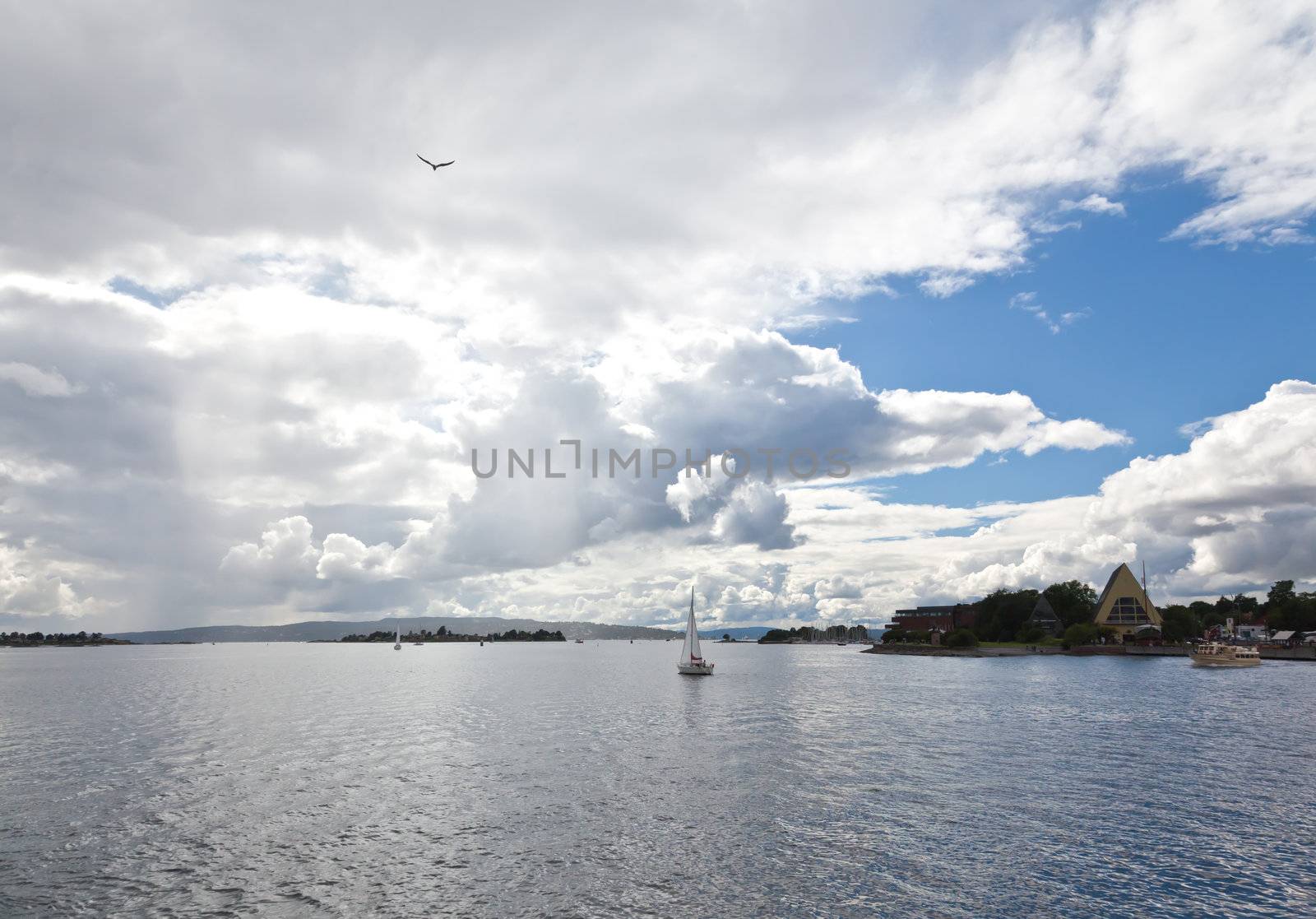 dramatic cloudscape in the harbor of Oslo Norway