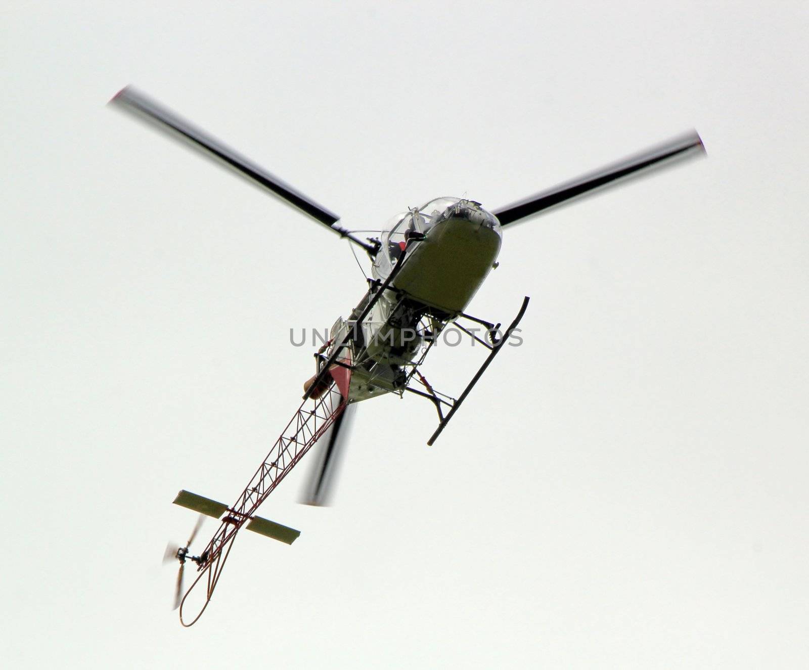 Flight of a helicopter viewed from under