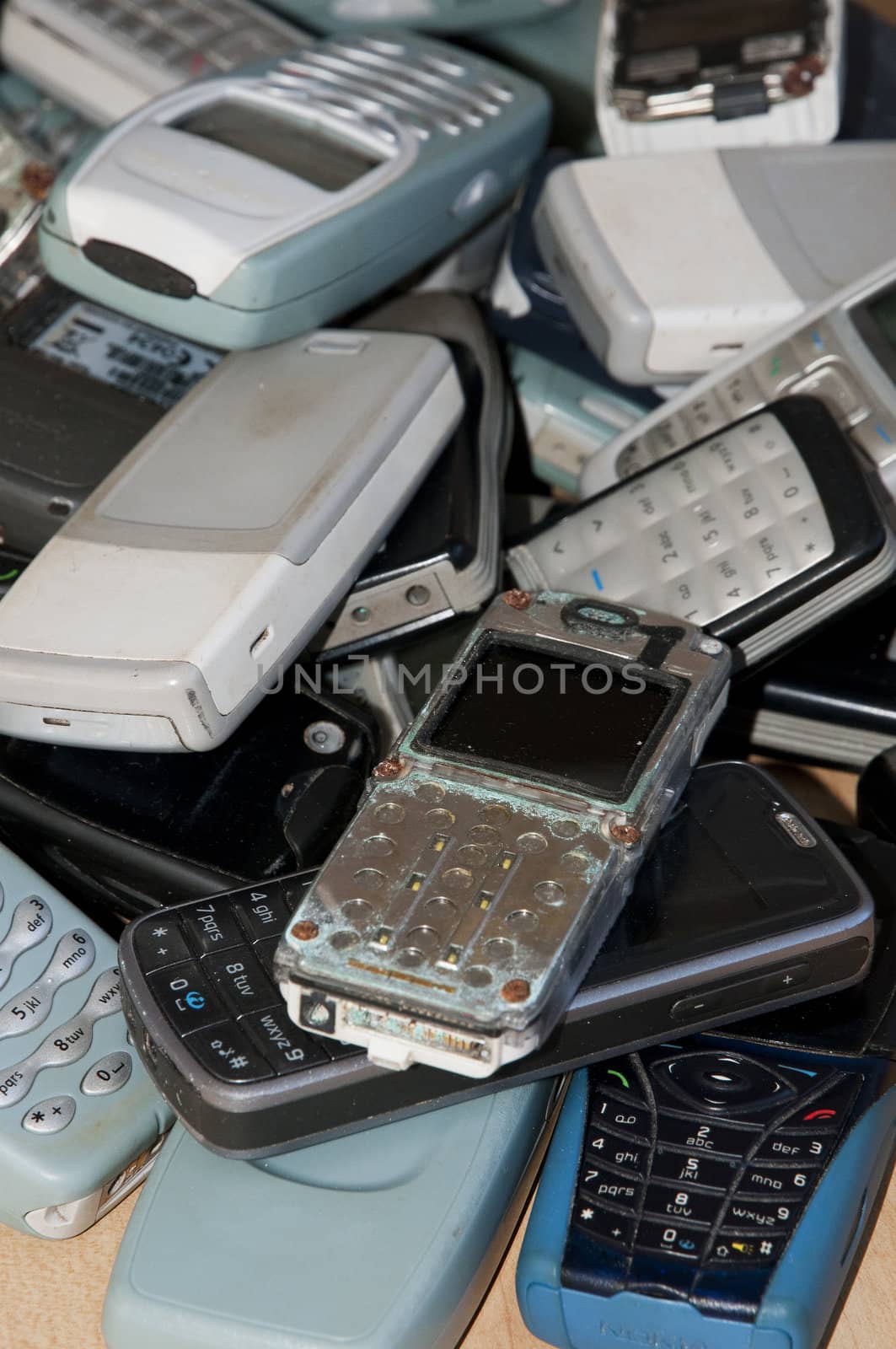 Close-up on an old mobile phones stack by shkyo30